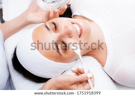 Face peeling at the beautician. Facial treatments. Chemical and salicylic peels. Royalty-Free Stock Photo #1751918399