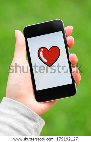 Love message on mobile phone screen