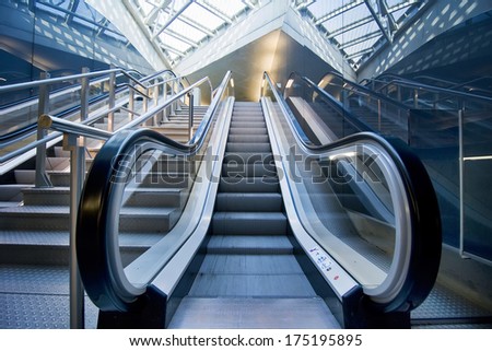  A panoramic angle of escalator / Escalator Royalty-Free Stock Photo #175195895