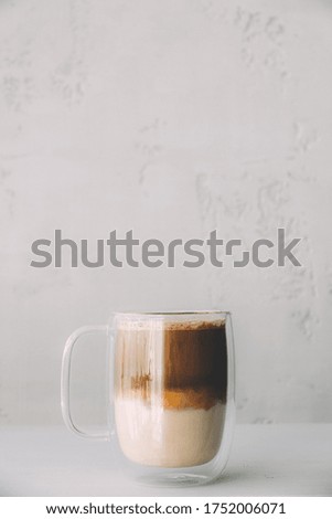 Coffee in Glass Cup on White Wooden Table Aroma Beverage Concept 