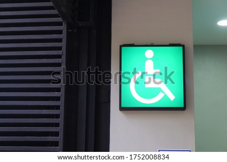 Toilet signage Disabled green and white background