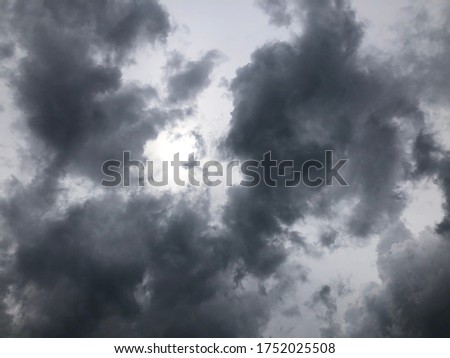 Atmosphere of overcast dusk sky before to rainy. Moody natural weather background. Dramatic storm cloudy and dark sky.