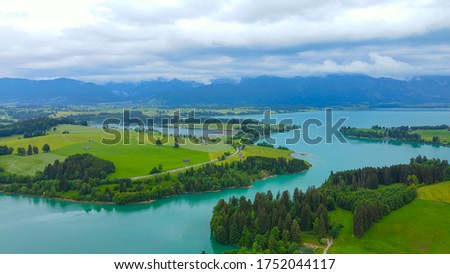 Aerial view over Lake Forggensee at the city of Fuessen in Bavaria Germany Royalty-Free Stock Photo #1752044117