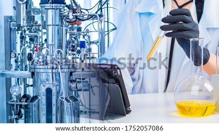 Conducting fermentation reactions. Research in the field of Microbiology. Development of live vaccines. Pharmacological testing of medicines. Bioreactor in the laboratory. Royalty-Free Stock Photo #1752057086