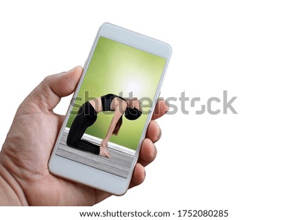 The image of an Asian woman doing yoga. In mobile phones