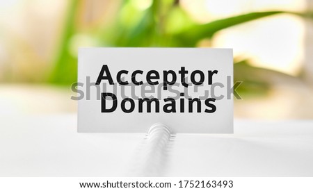 Acceptor Domain seo concept text on a white notebook and green flowers