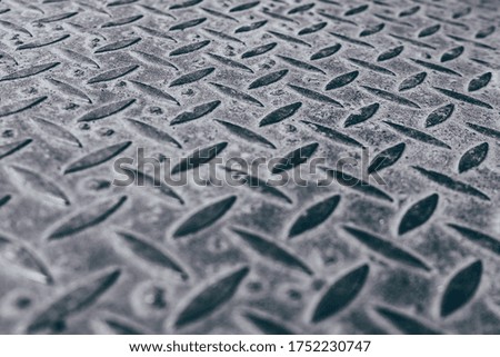 Close up of metal grunge background with repetitive patten