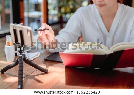 New normal after Coronavirus. Online learning or E-learning. Education anytime and Social connect at home. Asian woman lifestyle during Covid. Royalty-Free Stock Photo #1752236420