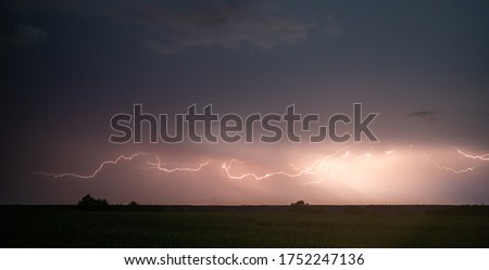 Massive thunder storm night sky
