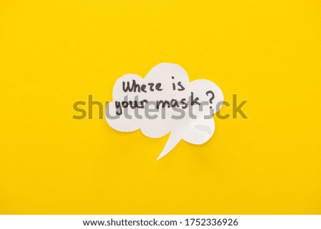 top view of speech bubble with where is your mask lettering on yellow background