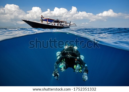Tech diver exploring under the water Royalty-Free Stock Photo #1752351332