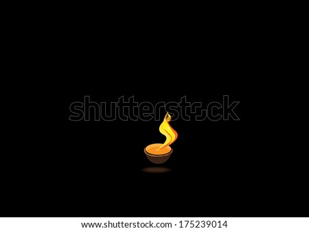 Diwali oil lamp glowing isolated on black background