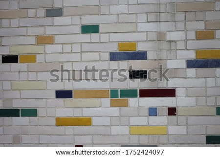 Kosmos building in Berlin, colourful bricks in the wall outside