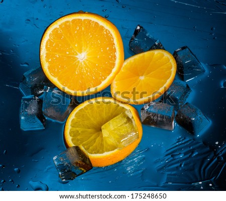 Freshness orange and cristal cube of ice for preparation of 