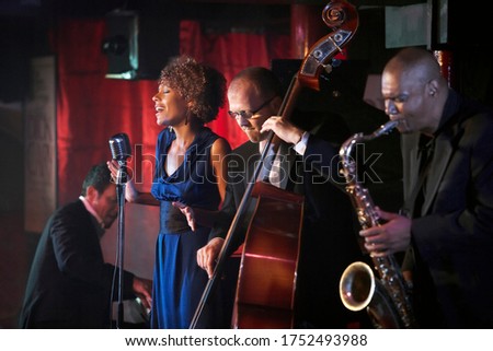 Jazz band performing in nightclub Royalty-Free Stock Photo #1752493988