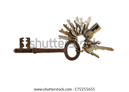 Genuine used keys including a Skeleton Key and others that fit various locks isolated on white with room for your text. Keys and locks have been used for hundreds of years to keep things safe. 