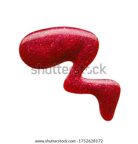 Blot of red nail polish isolated on white background. Macro photo. Top view