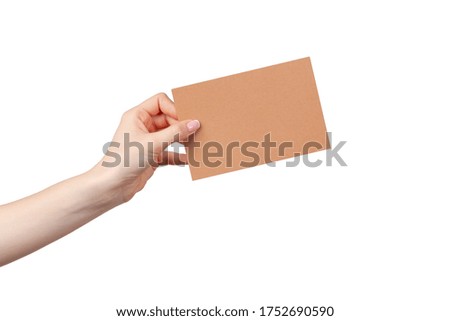 Woman hand hold business blank paper card isolated on white background