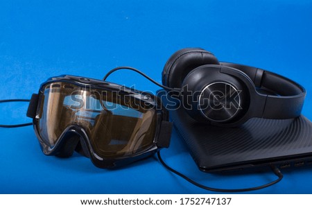 Laptop and headphones black copy space for text message