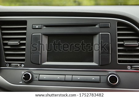 Modern media display in the interior of the car. Sensor screen with multimedia off