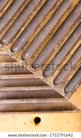 Wooden shapes to give the cigars their shape.  Royalty-Free Stock Photo #1752791642