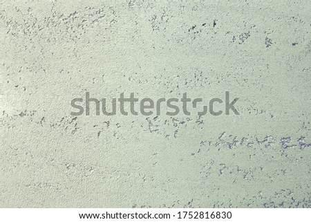 beautiful aged purple decorative stucco texture for use as background.