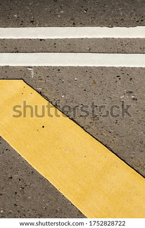 Yellow and white road paint