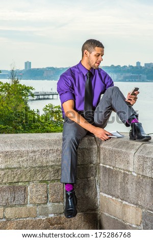 Dressing in a purple shirt, gray pants 