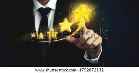 Customer review satisfaction feedback survey concept. User give rating to service experience on online application. Customer can evaluate quality of service leading to reputation ranking of business. Royalty-Free Stock Photo #1752872132