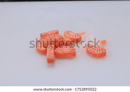 Famous orange color candy or peppermint in India