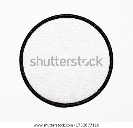 Patch, blank, circle. White with black trim. Royalty-Free Stock Photo #1752897110