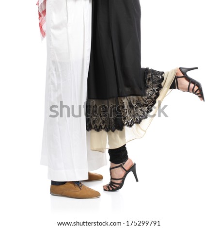 Arab saudi emirates couple legs hugging isolated on a white background           