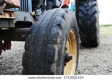 Worn, Bald Tyres Of A Tractor