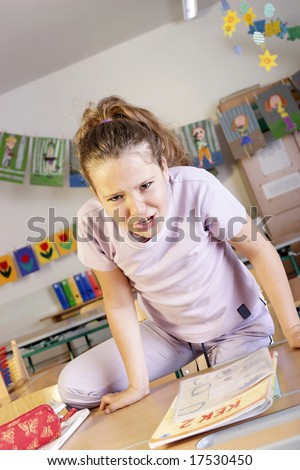 a schoolgirl in a classroom