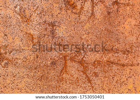 Texture of rusty crumpled metal in the center. dent lines on old metal sheet