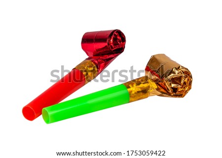 Party foil whistle or noise maker horn rolled isolated on the white