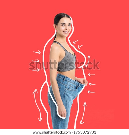 Young woman in loose clothes after weight loss on color background Royalty-Free Stock Photo #1753072901
