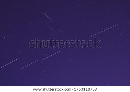 Starlink satellites in the  summer night sky.