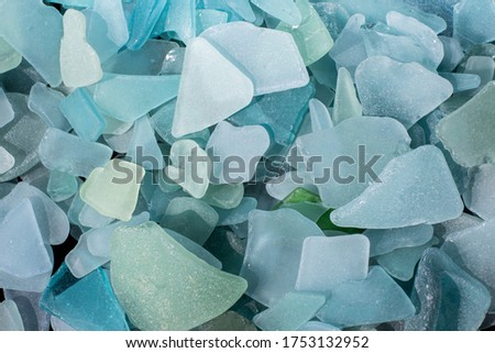 Sea Glass Mosaic, patterns made from Ocean glass, its a lifestyle background made with natural colours of blue, green, brown and white, hand made feeling like handcraft. Beach Glass, Ocean Glass Royalty-Free Stock Photo #1753132952