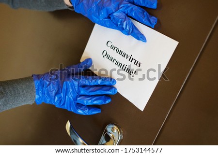 Coronavirus quarantine sign on the apartment door.