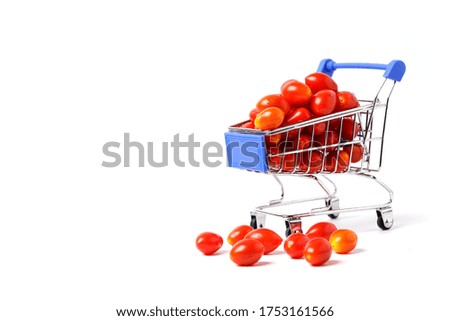 cherry tomato in cart isolated on white background. Fresh plum tomatoes .
