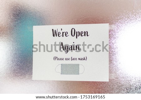 sign back open your business face mask in the new normal, concept back open business covid