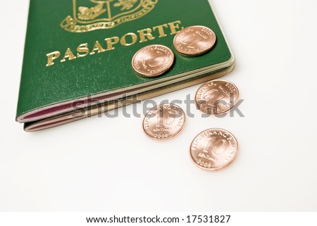 Passport and ten-centevo coins on white background