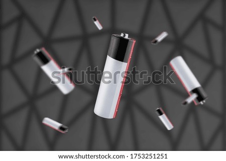 Batteries in blur against a dark background.