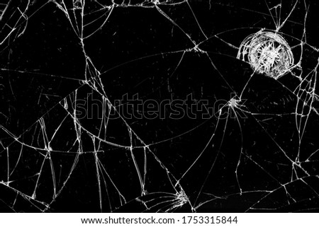 broken glass abstract background many cracks. broken smartphone screen