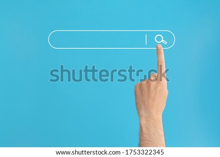 Finger presses the search button in the search bar on a blue background.