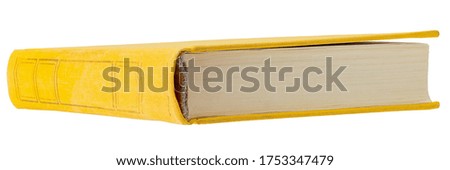 Yellow hardcover book isolated on white background.