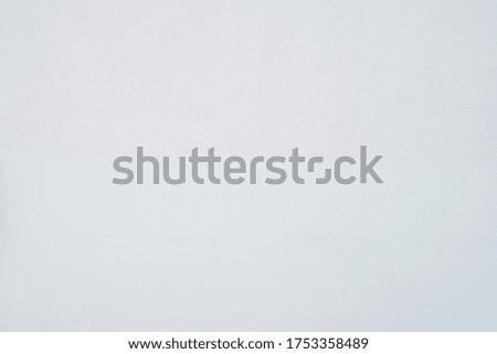 Abstract white grunge cement wall texture background.Ideal for use in the design put images and insert text.