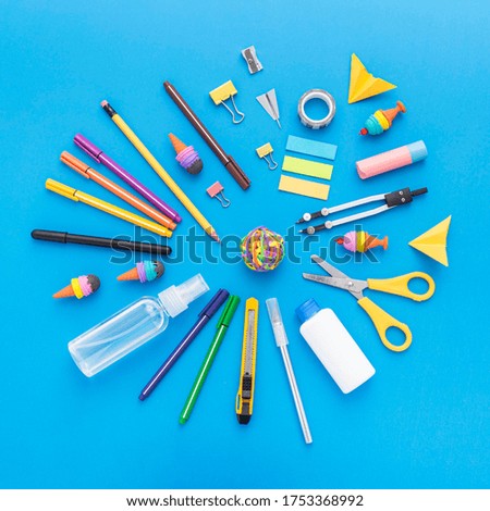 Top view of school supplies with pencils and scissors Photo