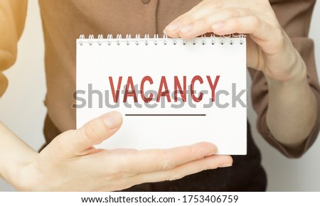 Text sign showing Job Application. Conceptual photo paper which indicates interest in a particular vacancy Male human wear formal work suit office look hold mathematics book use hand.